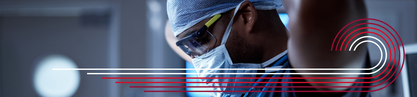 Surgeon tying mask