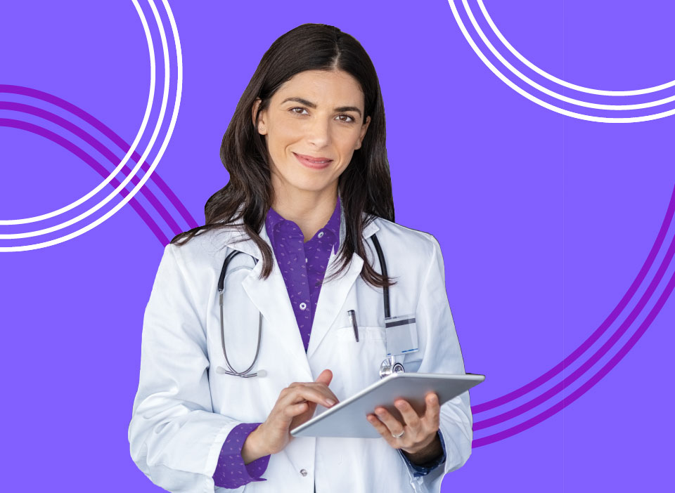 eBook Image - Female doctor viewing patient info on a tablet